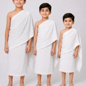 Three boys wearing Orchid Premium Kids Cotton Ihram in sizes 25x50, 30x60, and 35x70 for ages 2–15 years on a white studio background.